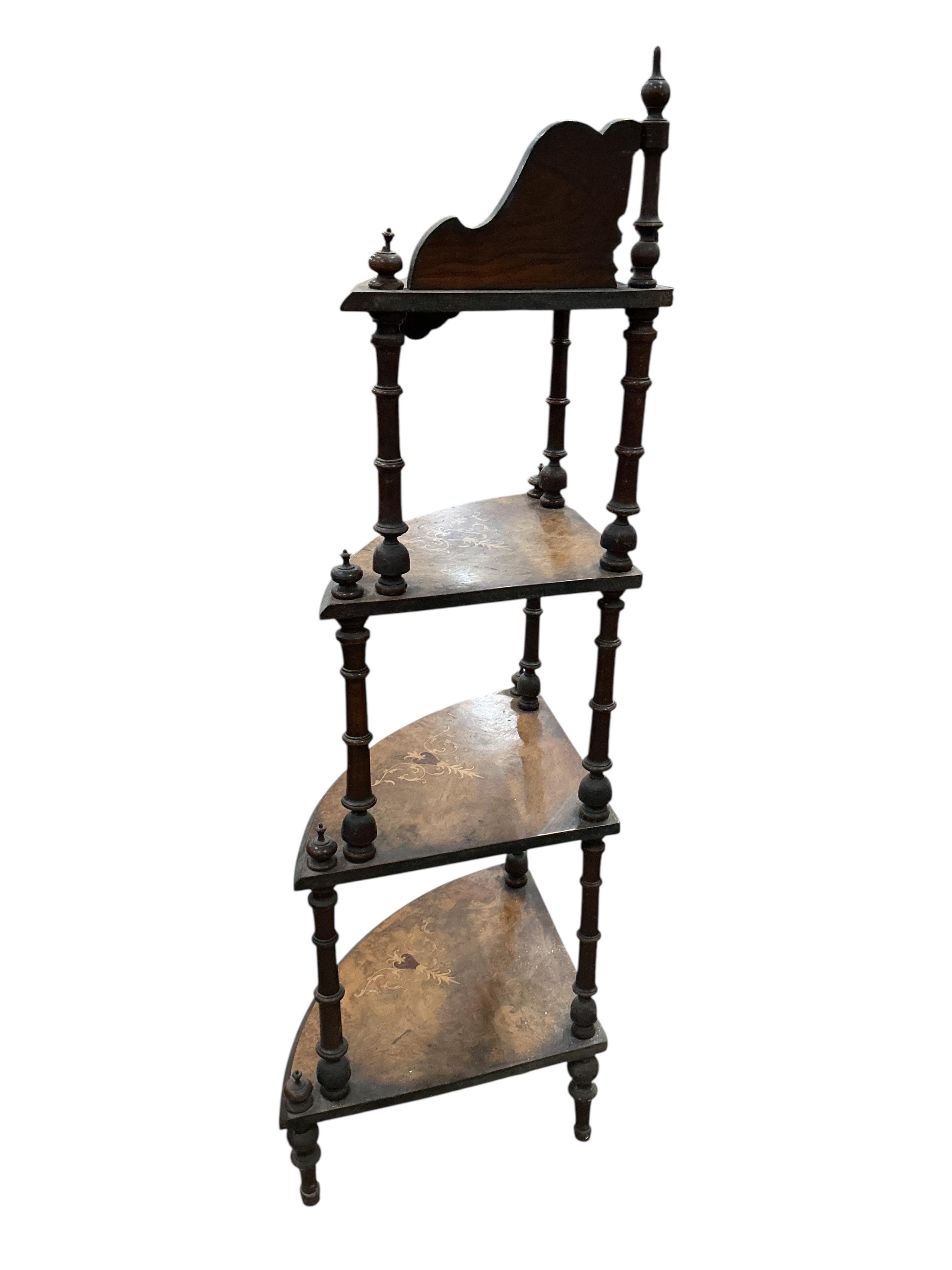 A Victorian inlaid walnut corner whatnot, width 64cm, depth 40cm, height 132cm.